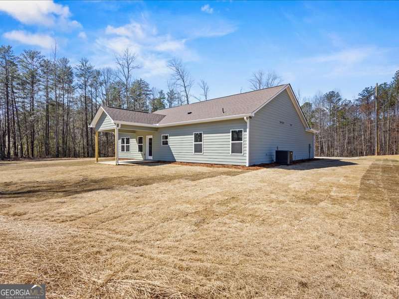 1495 Kansas Jake Road Waco, GA 30182 - Photo 31 of 34 a house with yard in front of it