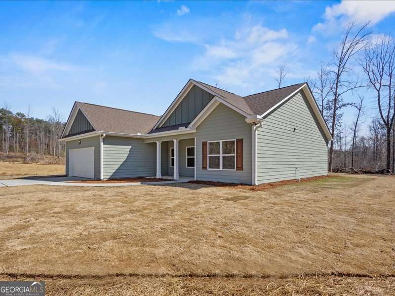 1495 Kansas Jake Road Waco, GA 30182 - Photo 4 of 34 a house with trees in the background