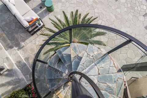 a view of staircase with a rug