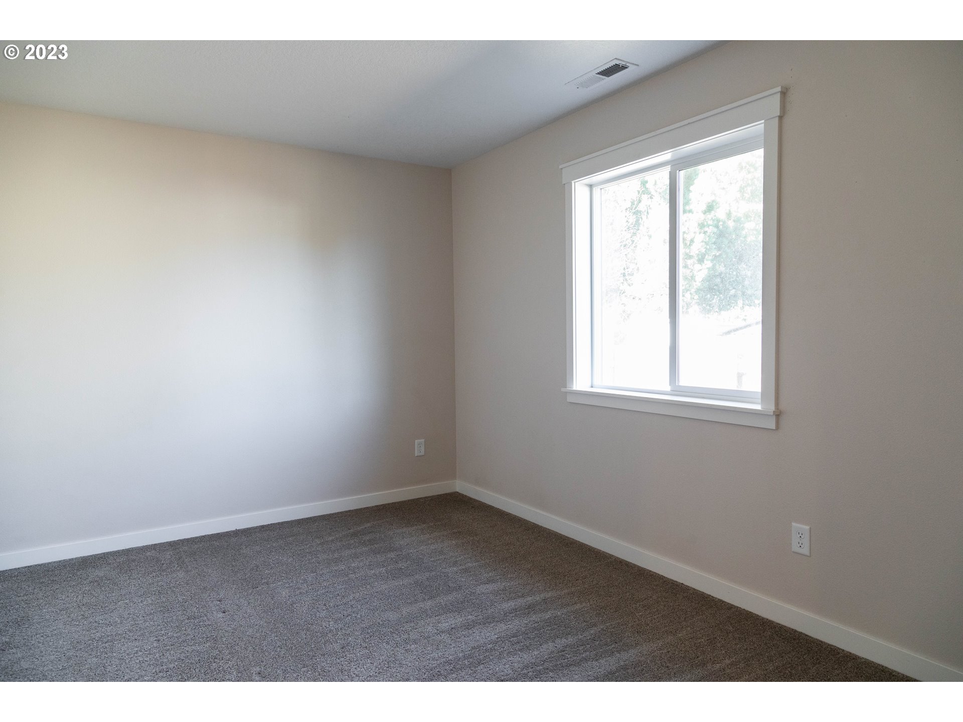 769 Southeast Meadows Loop Sheridan, OR 97378 - Photo 13 of 20 a view of an empty room and window