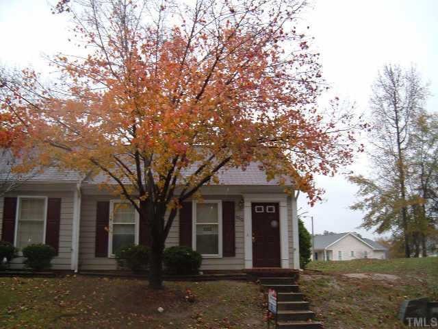 8222 Merriweather Circle Raleigh, NC 27616 - Photo 1 of 1 a front view of a house with garden