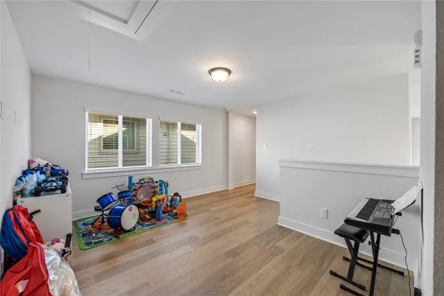 a bathroom with a sink a toilet and shower a mirror