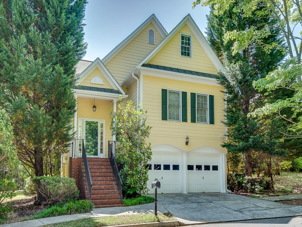 509 Sycamore Ridge Drive Decatur, GA 30030 - Photo 1 of 1 a front view of a house with garden