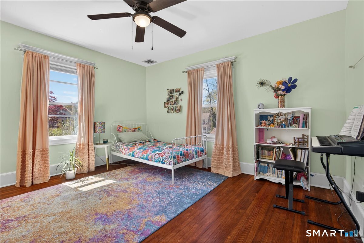 144 Mather Street Hamden, CT 06517 - Photo 18 of 40 a living room with furniture and a wooden floor