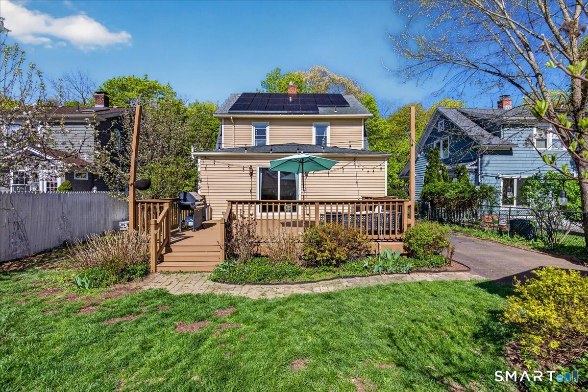 144 Mather Street Hamden, CT 06517 - Photo 29 of 40 a front view of a house with a garden