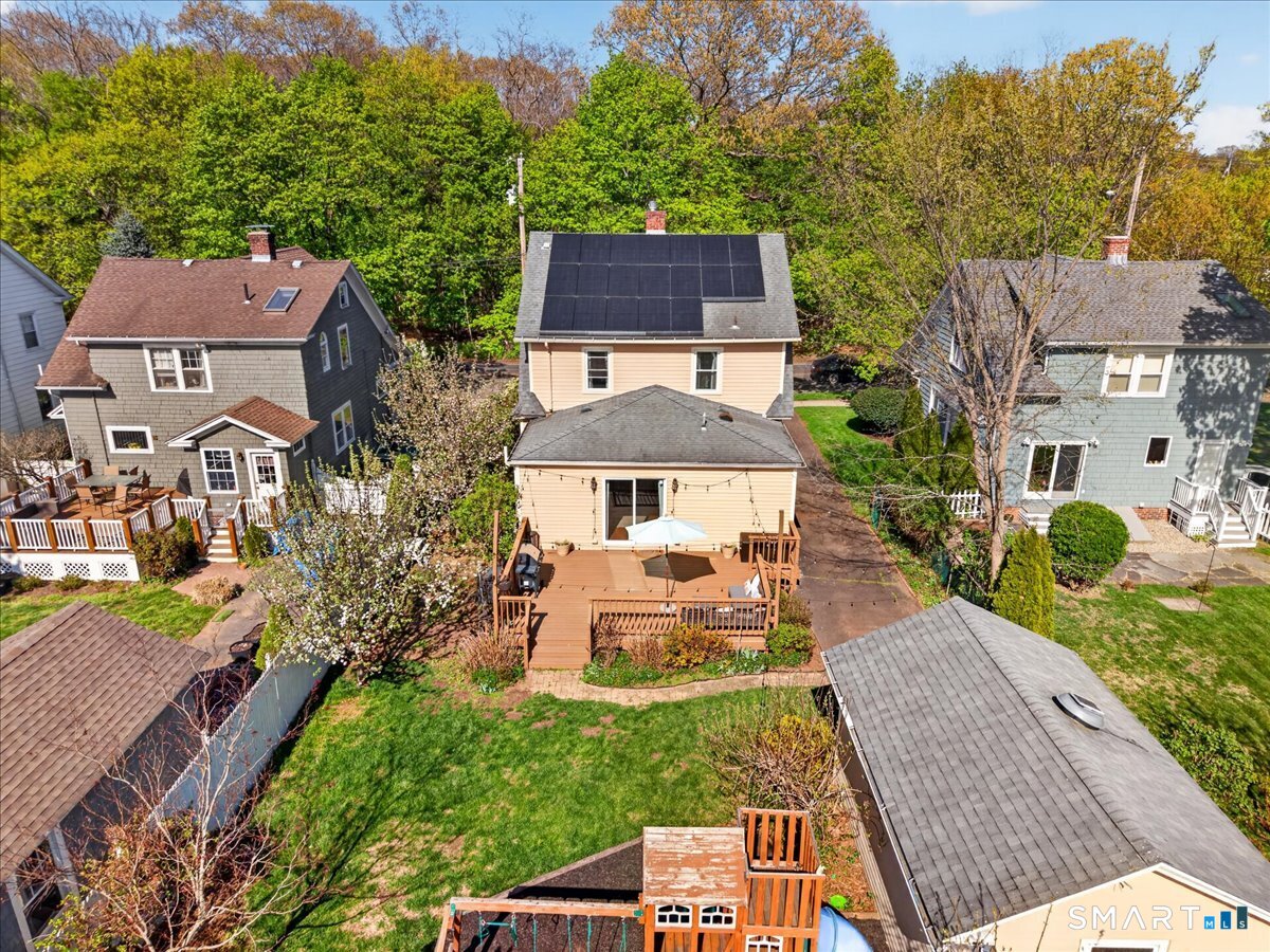 144 Mather Street Hamden, CT 06517 - Photo 35 of 40 aerial view of a house with a yard