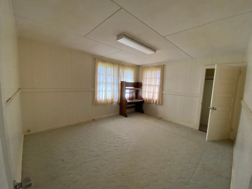 17-324 Volcano Road Kurtistown, HI 96749 - Photo 17 of 30 a view of empty room with closet and windows