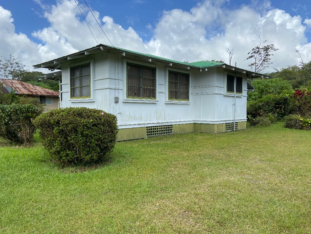 17-324 Volcano Road Kurtistown, HI 96749 - Photo 3 of 30 a house with garden in front of it