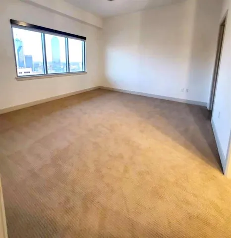 a view of room with cabinets