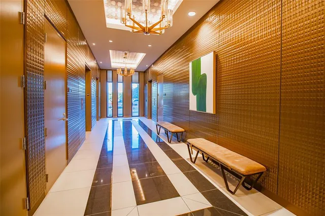 a view of swimming pool with outdoor seating