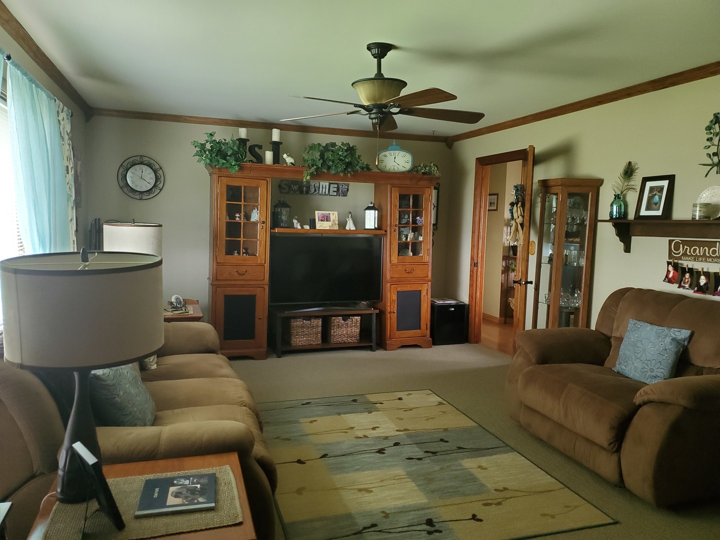 2502 Tower Road West Brooklyn, IL 61378 - Photo 2 of 26 a living room with furniture and a flat screen tv