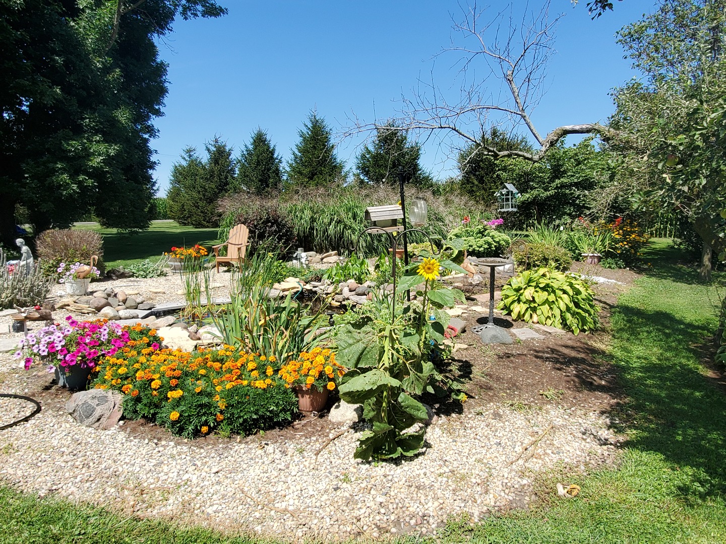 2502 Tower Road West Brooklyn, IL 61378 - Photo 21 of 26 a view of a garden with a flower garden