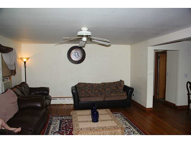 303 Mitchell's Lane Middletown, RI 02842 - Photo 8 of 12 Living Room.