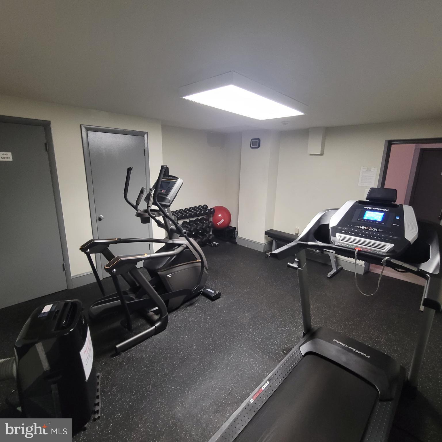 1673 Park Road Northwest, Unit 502 Washington, DC 20010 - Photo 20 of 23 a room with gym equipment