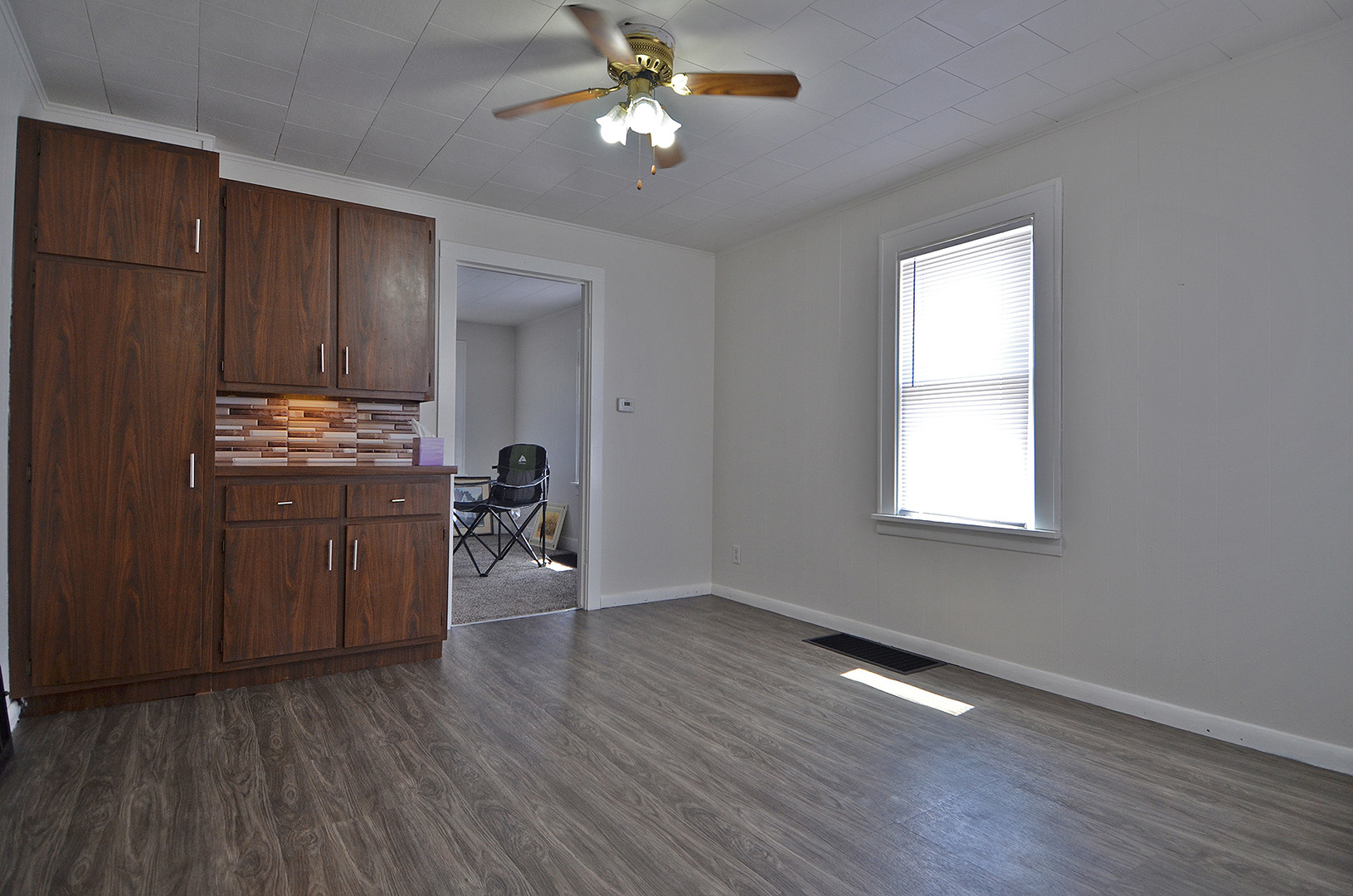 1617 Pine Street Ottawa, IL 61350 - Photo 4 of 13 wooden floor in an empty room with a window