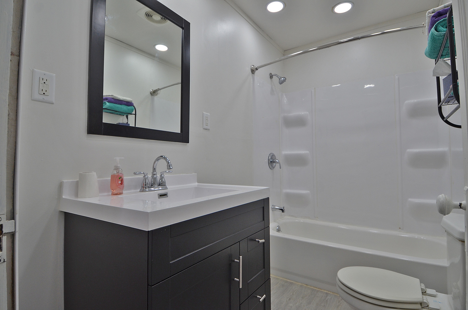 1617 Pine Street Ottawa, IL 61350 - Photo 7 of 13 a bathroom with a sink a toilet and shower