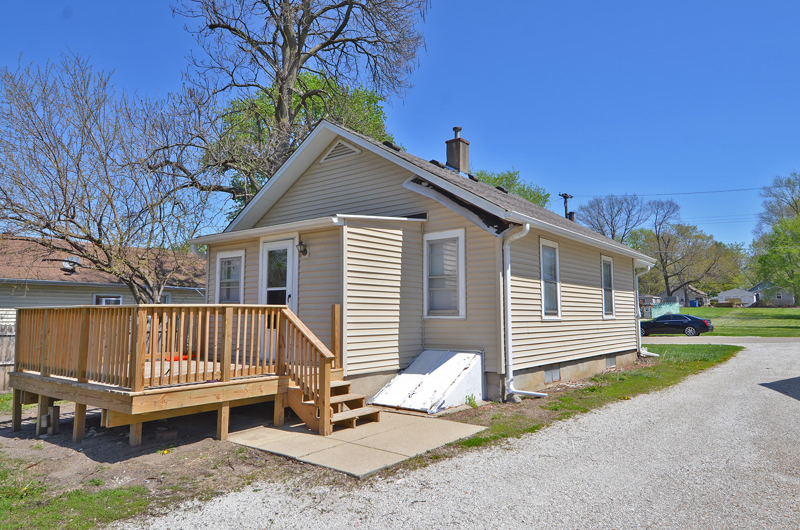 1617 Pine Street Ottawa, IL 61350 - Photo 10 of 13 a view of a house with a wooden deck and a yard