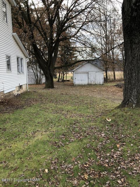 592 Interchange Road Kresgeville, PA 18333 - Photo 3 of 3 a big tree in middle of the garden