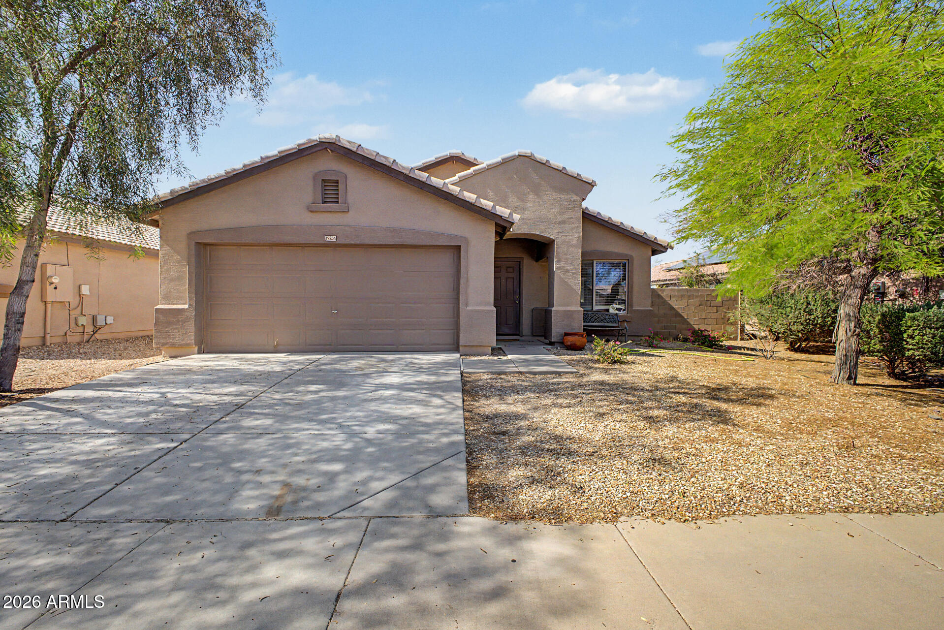 17236 West Durango Street Goodyear, AZ 85338 - Photo 1 of 14 a view of a house with a yard