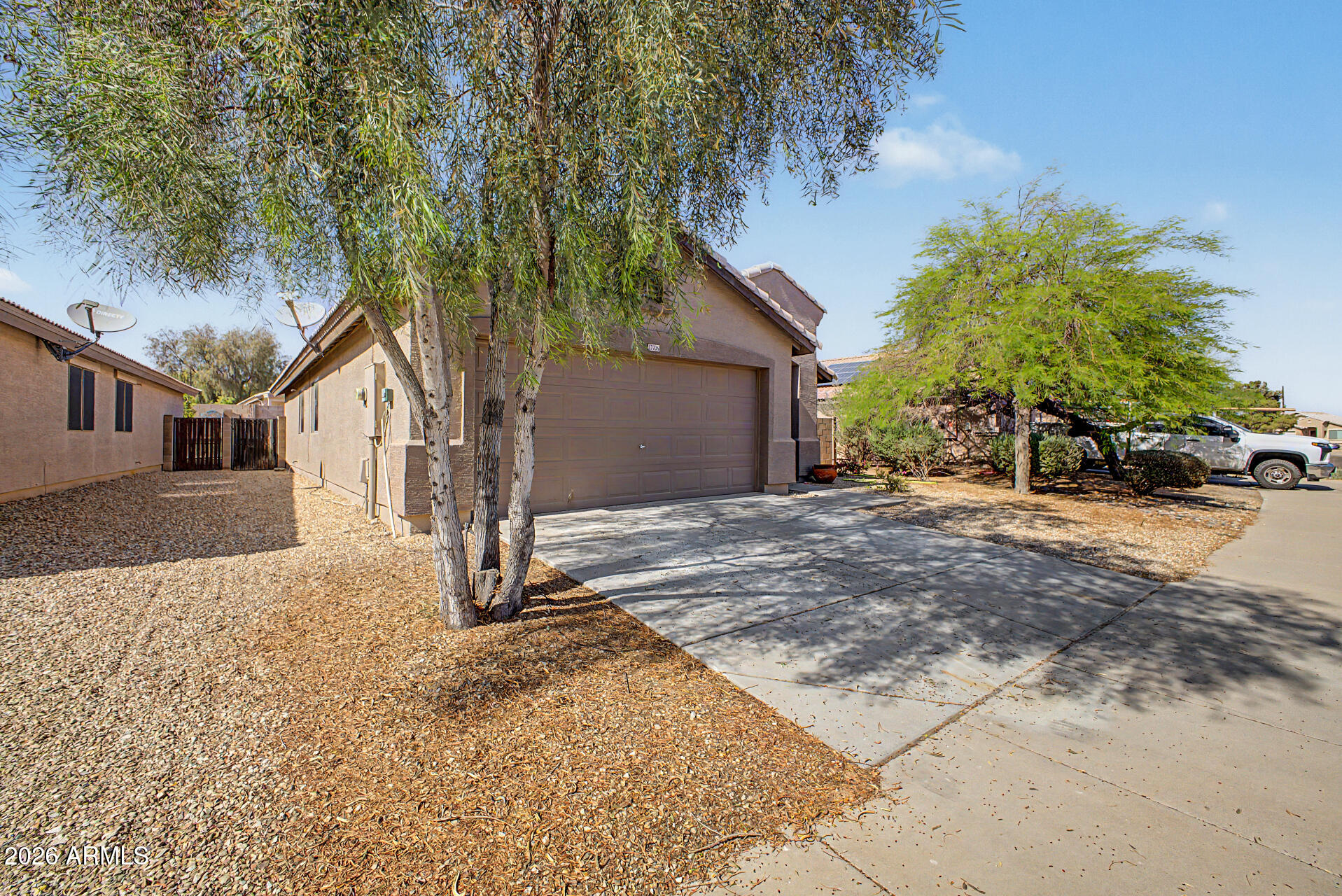 17236 West Durango Street Goodyear, AZ 85338 - Photo 2 of 14 a view of a house with a yard