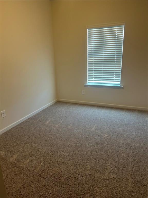 671 Mountaintop Road Cartersville, GA 30120 - Photo 12 of 14 a view of a room that has a window in it
