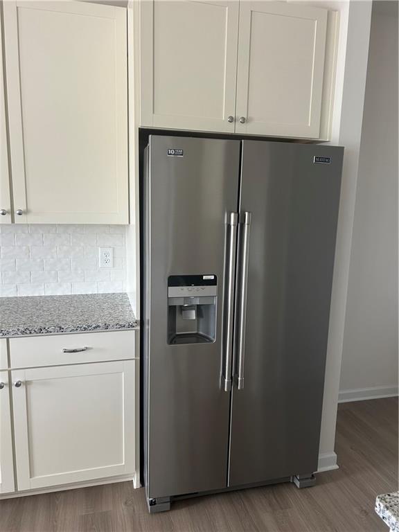 671 Mountaintop Road Cartersville, GA 30120 - Photo 6 of 14 a kitchen with metallic refrigerator freezer and a dishwasher