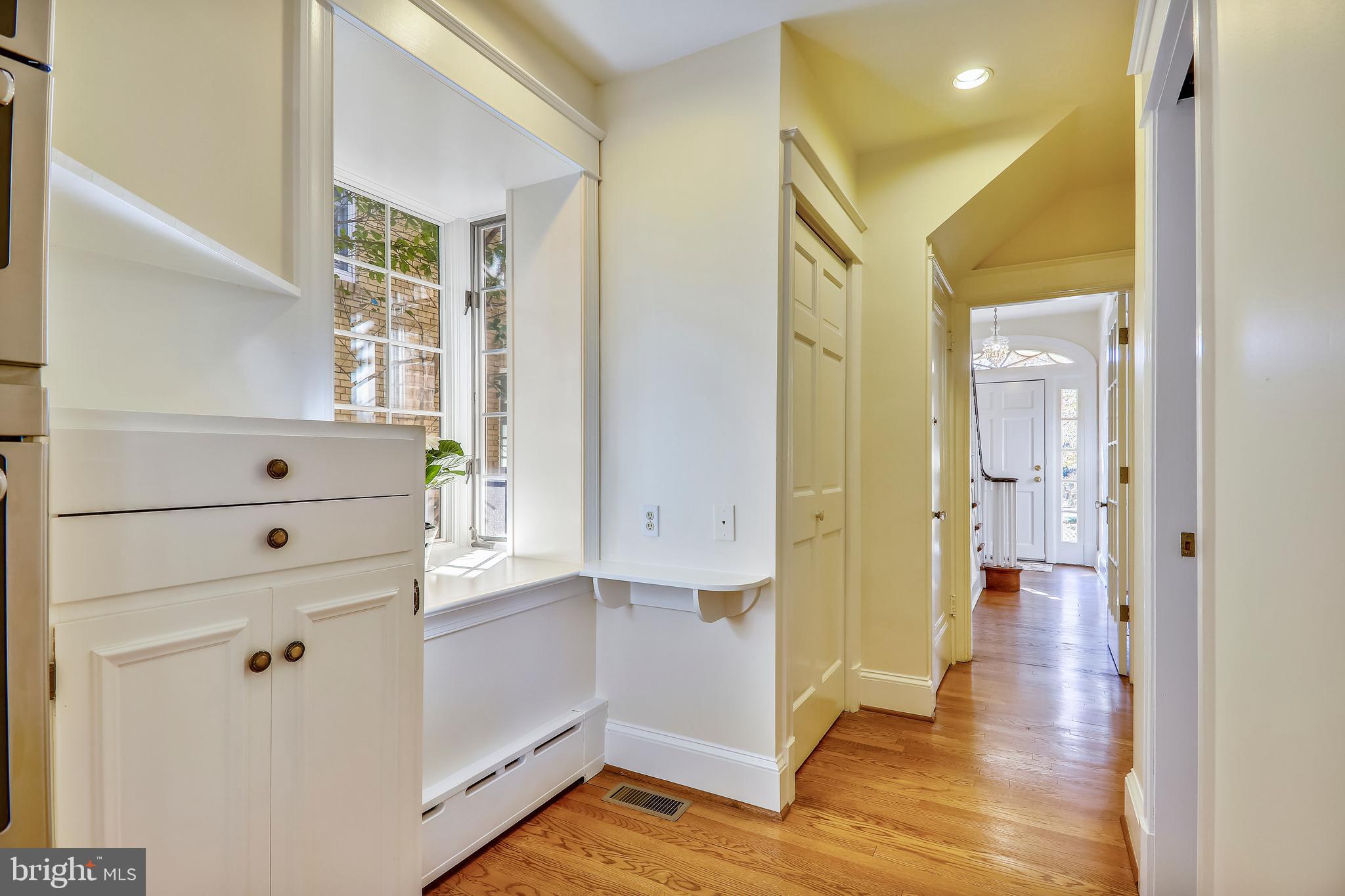 6111 Broad Branch Road Northwest Washington, DC 20015 - Photo 21 of 46 Hall with Powder Room & coat closet