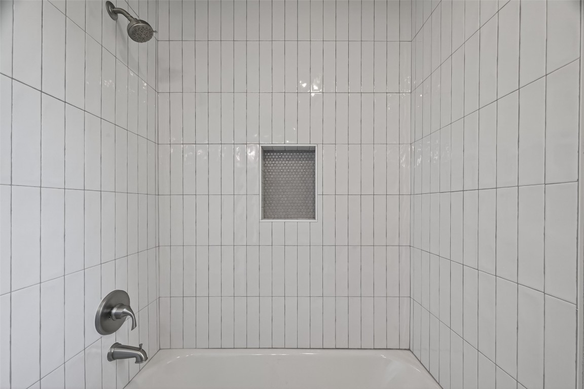 11406 Caesar Drive Houston, TX 77477 - Photo 24 of 32 a bathroom with a shower