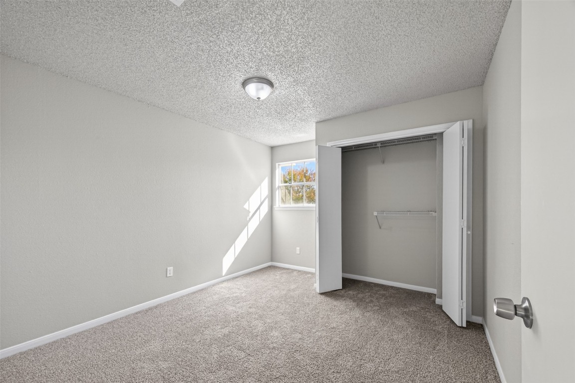 11406 Caesar Drive Houston, TX 77477 - Photo 25 of 32 an empty room with closet