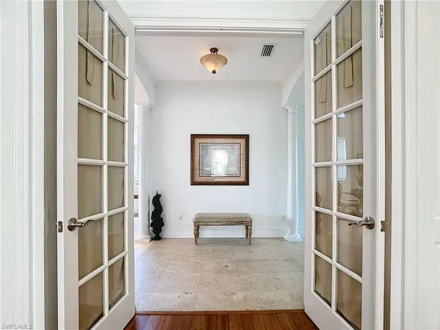 a hallway with windows