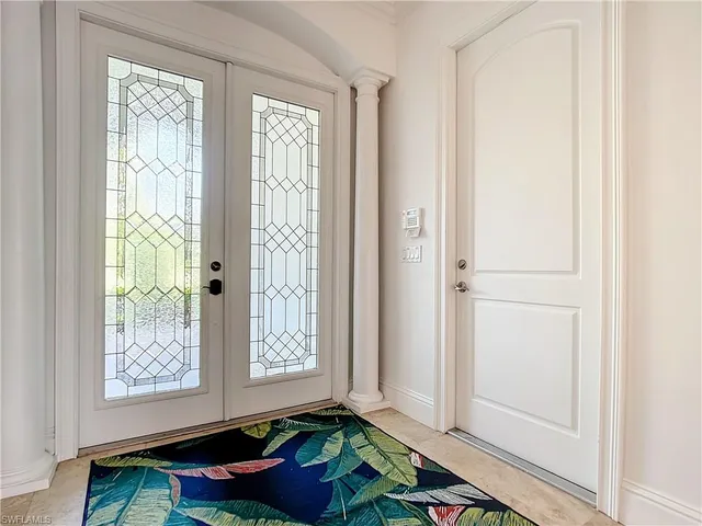 a room with window and a table