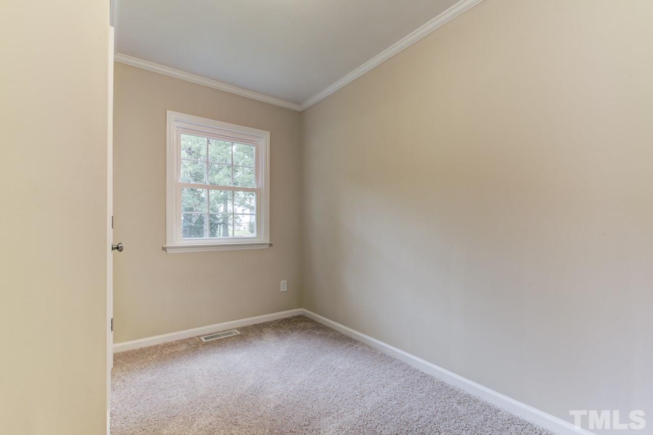 2308 Lilac Lane Raleigh, NC 27612 - Photo 12 of 25 an empty room with a window