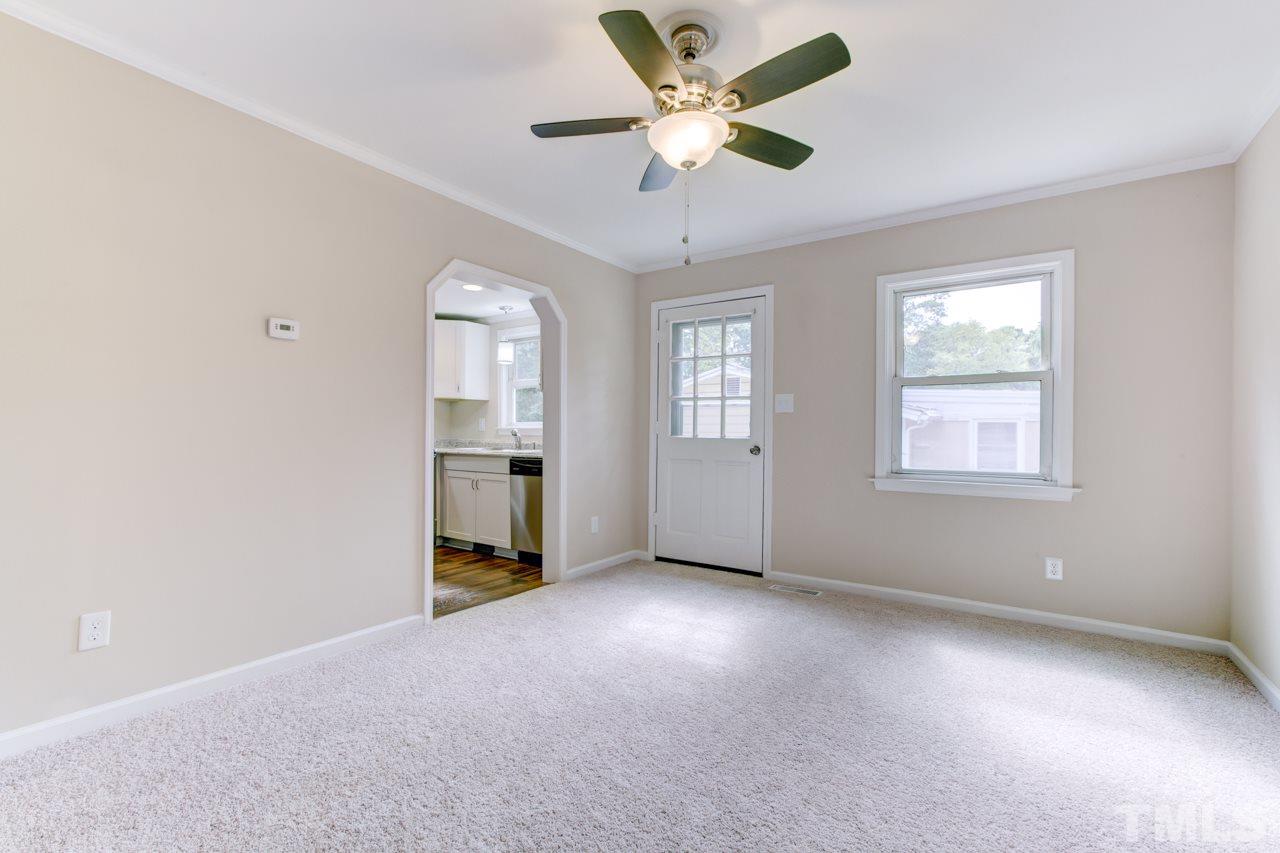 2308 Lilac Lane Raleigh, NC 27612 - Photo 18 of 25 a view of an empty room with a window