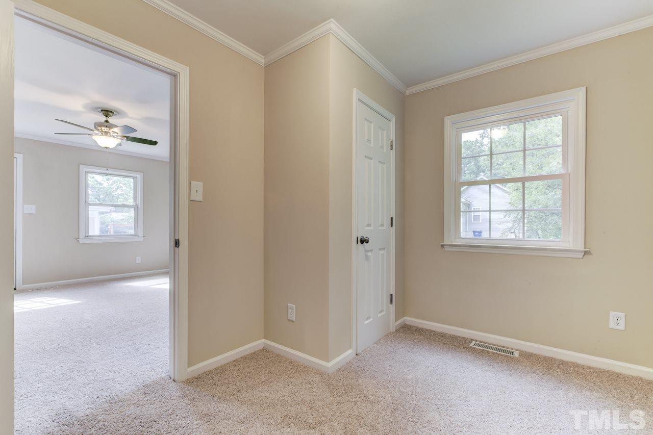 2308 Lilac Lane Raleigh, NC 27612 - Photo 21 of 25 an empty room that has a window