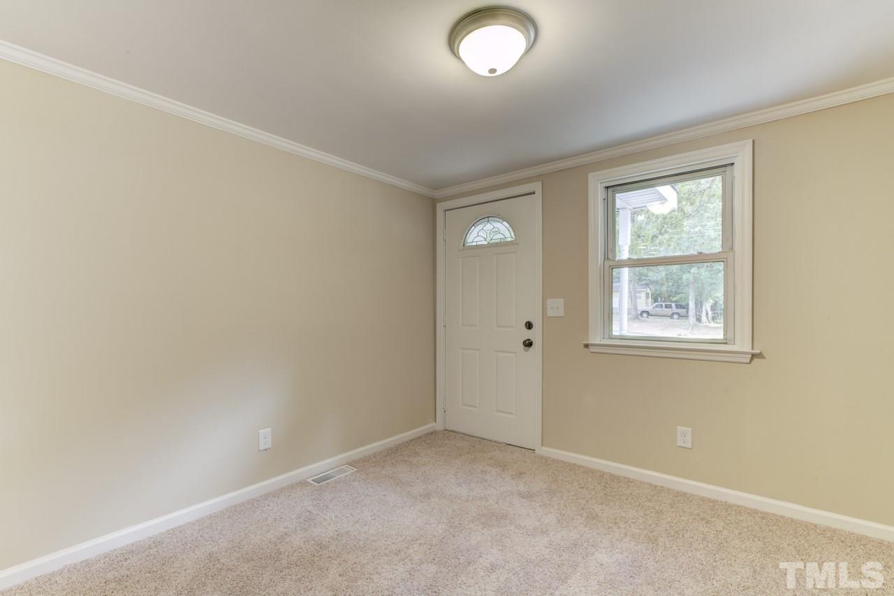 2308 Lilac Lane Raleigh, NC 27612 - Photo 10 of 25 an empty room with windows