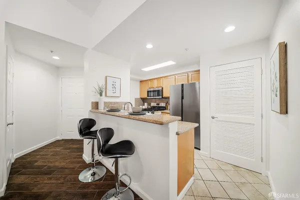 a view of dining room with furniture and washing machine