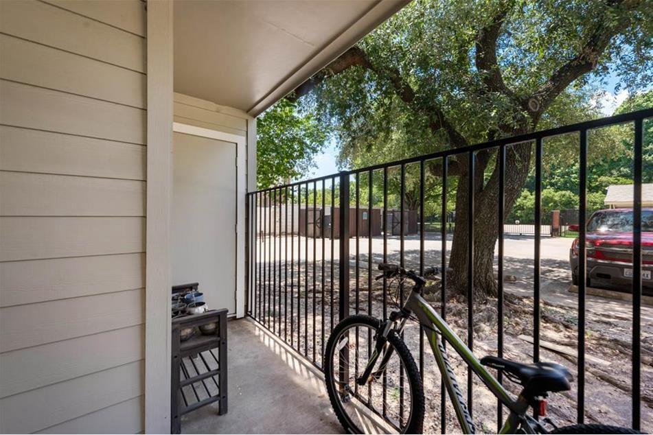 6900 Skillman Street, Unit 101 Dallas, TX 75231 - Photo 4 of 13 a view of a balcony