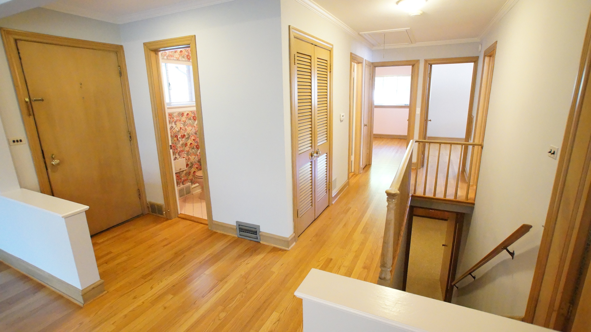 459 Highcrest Drive Wilmette, IL 60091 - Photo 7 of 26 a view of an entryway with wooden floor and door