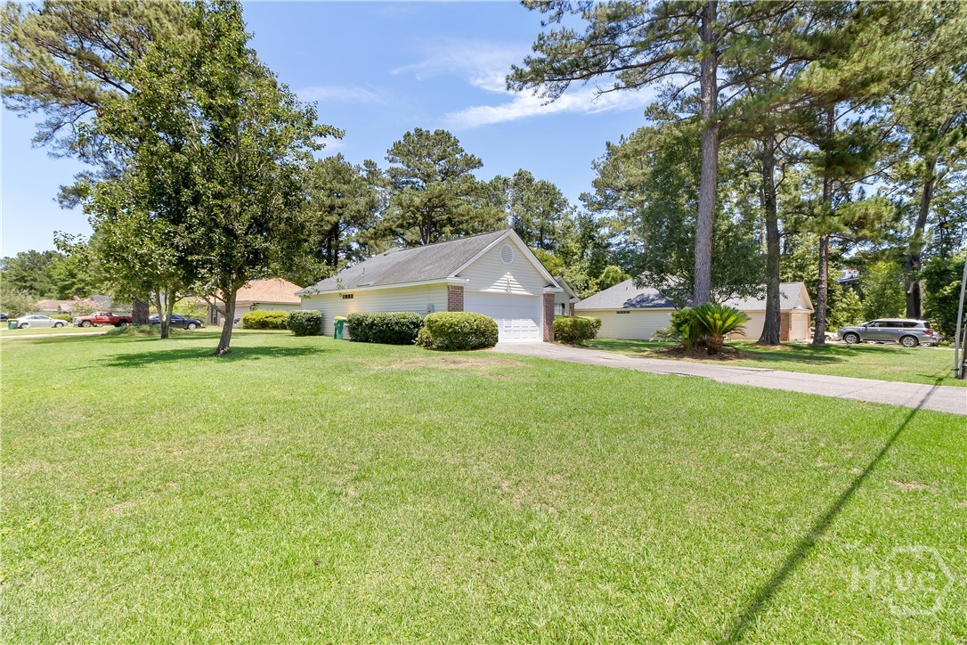 412 Greenway Street Pooler, GA 31322 - Photo 2 of 20 Side angle of front yard