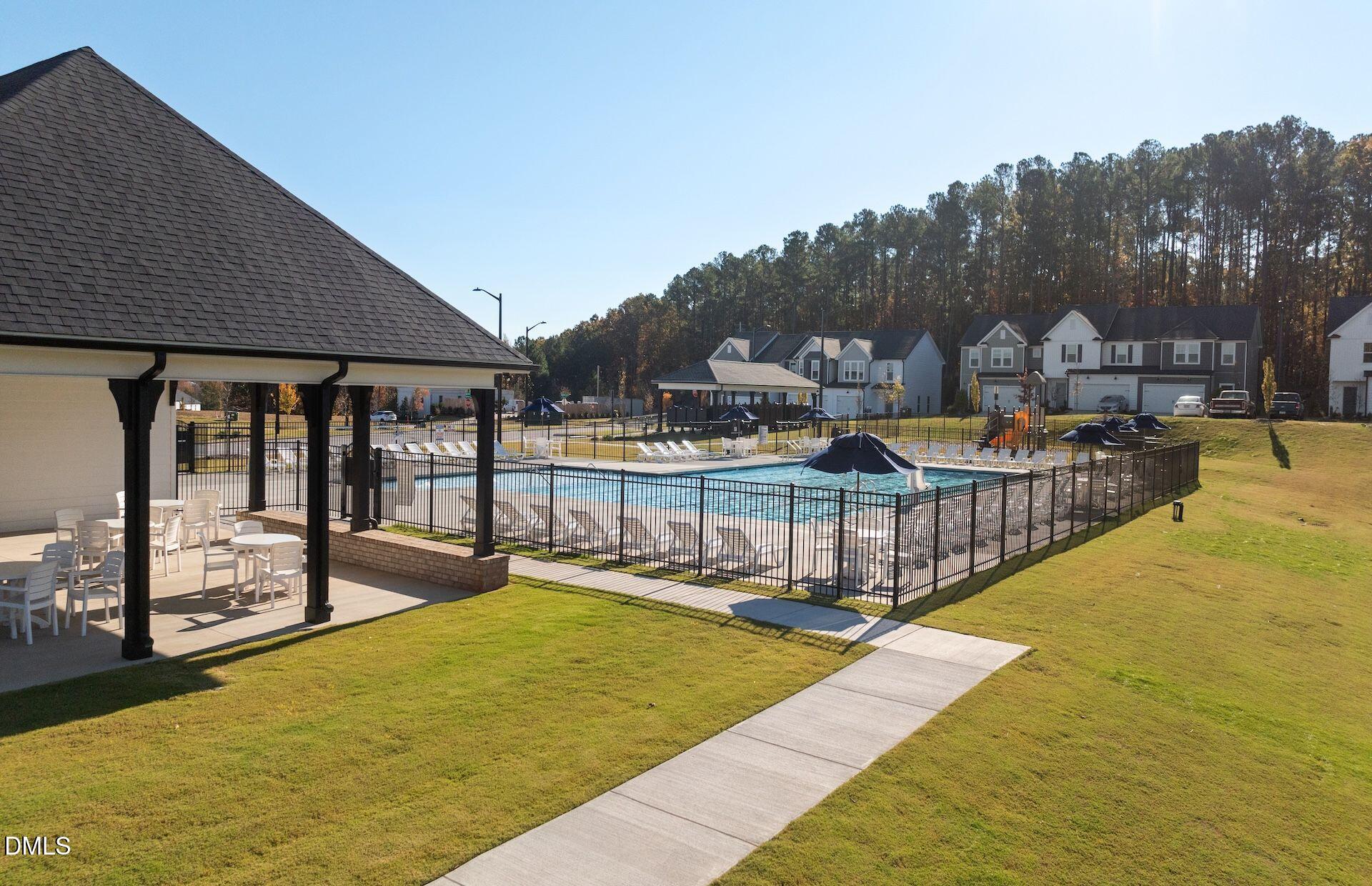 5020 Reader Way Durham, NC 27703 - Photo 22 of 32 a view of a swimming pool with a patio
