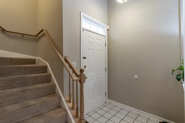 a view of entryway with stairs