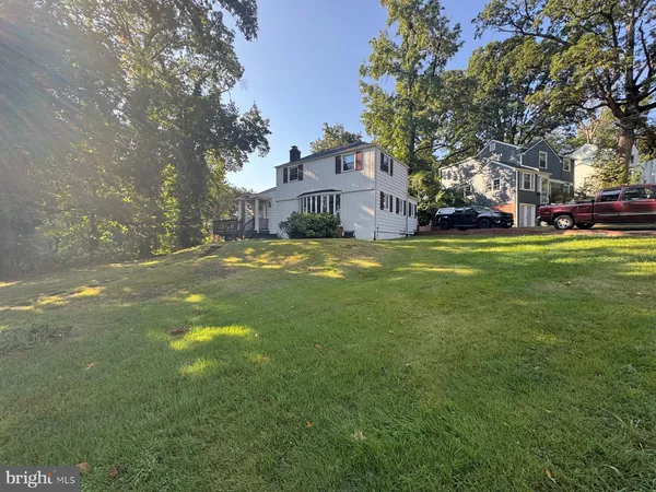 a view of a house with a big yard