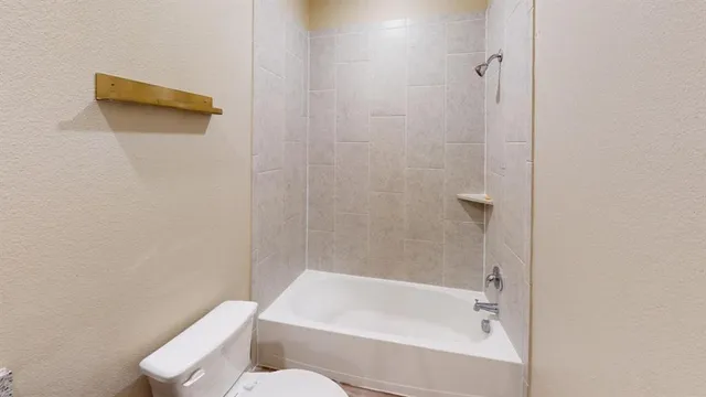 a backyard of a house with yard and garage