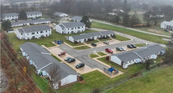 a aerial view of a house with outdoor space