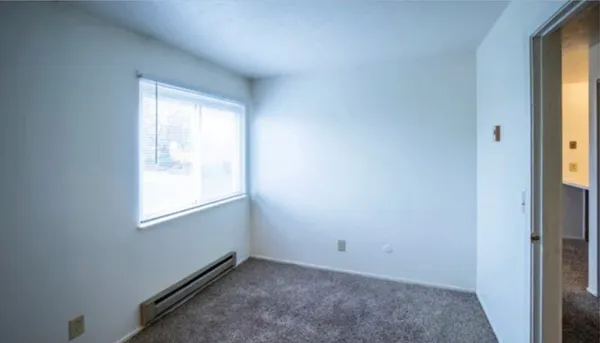 an empty room with windows