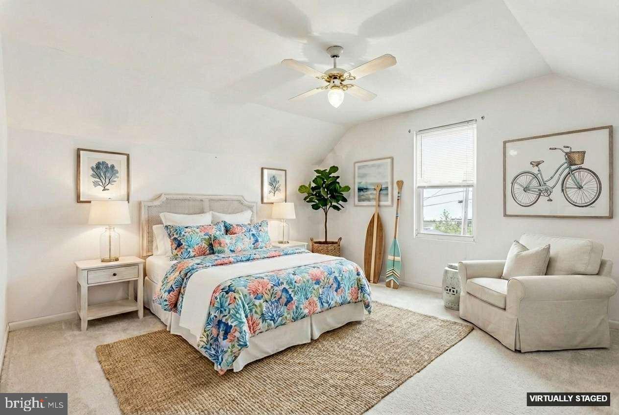 2810 & 2810-a 12th Street Baltimore, MD 21219 - Photo 12 of 67 a bedroom with a bed and a couch