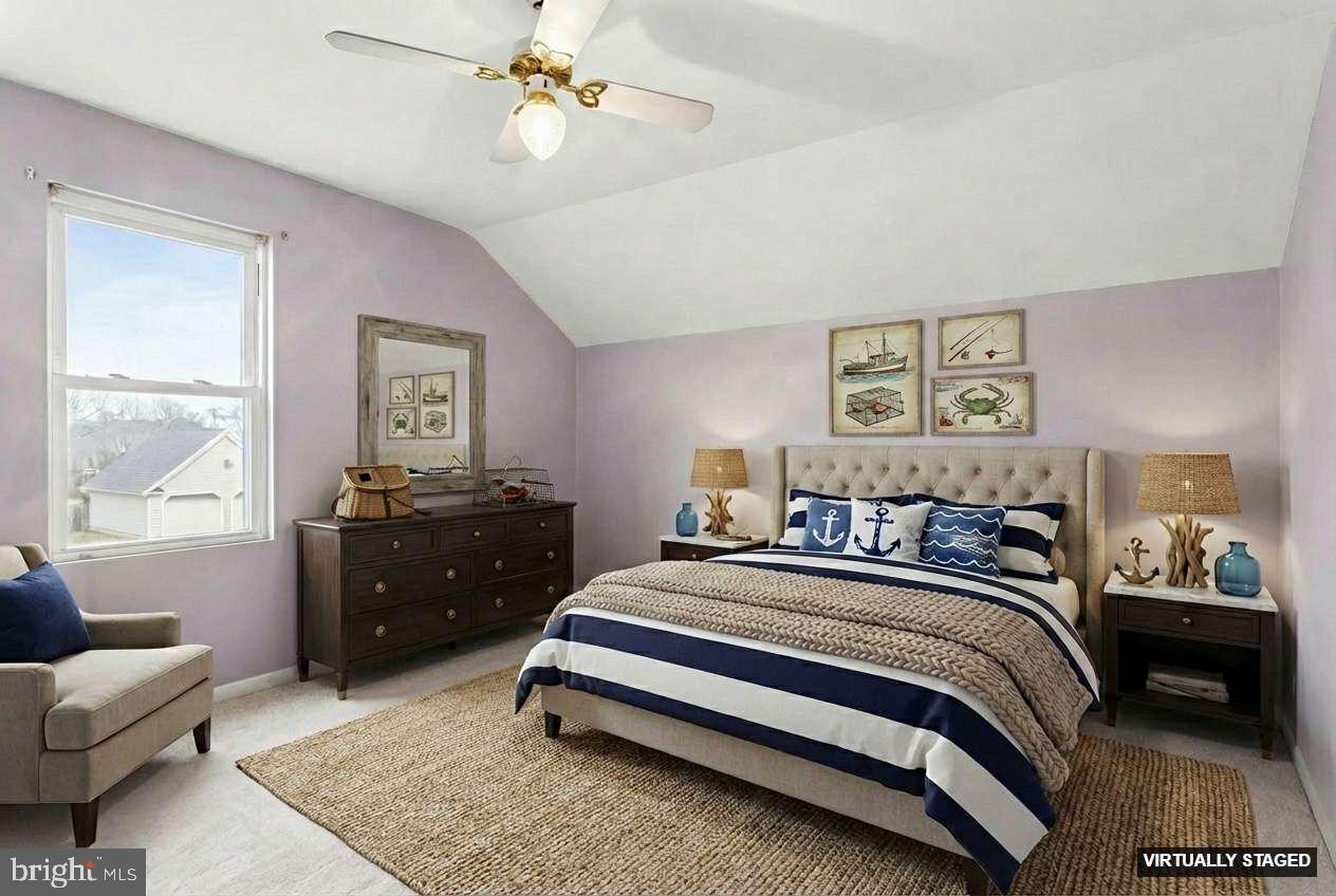 2810 & 2810-a 12th Street Baltimore, MD 21219 - Photo 13 of 67 a bedroom with a bed and a couch