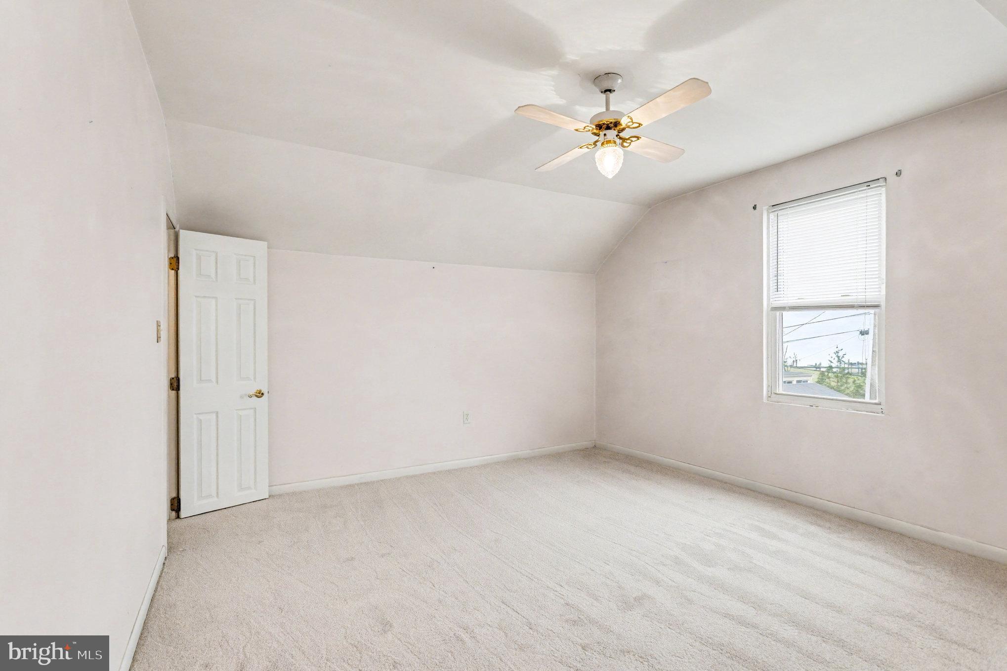 2810 & 2810-a 12th Street Baltimore, MD 21219 - Photo 36 of 67 a view of an empty room with a window