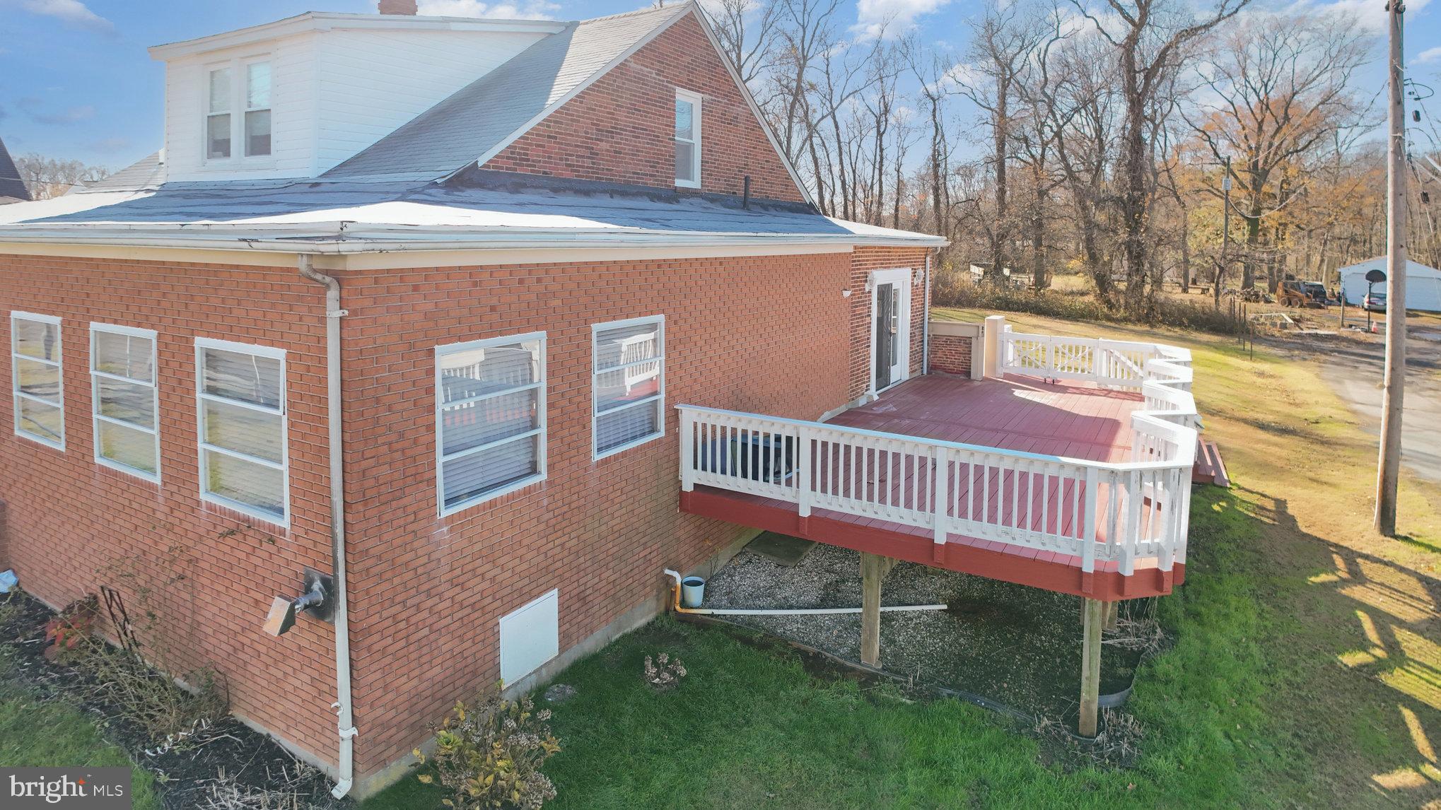 2810 & 2810-a 12th Street Baltimore, MD 21219 - Photo 42 of 67 a front view of a house with a yard