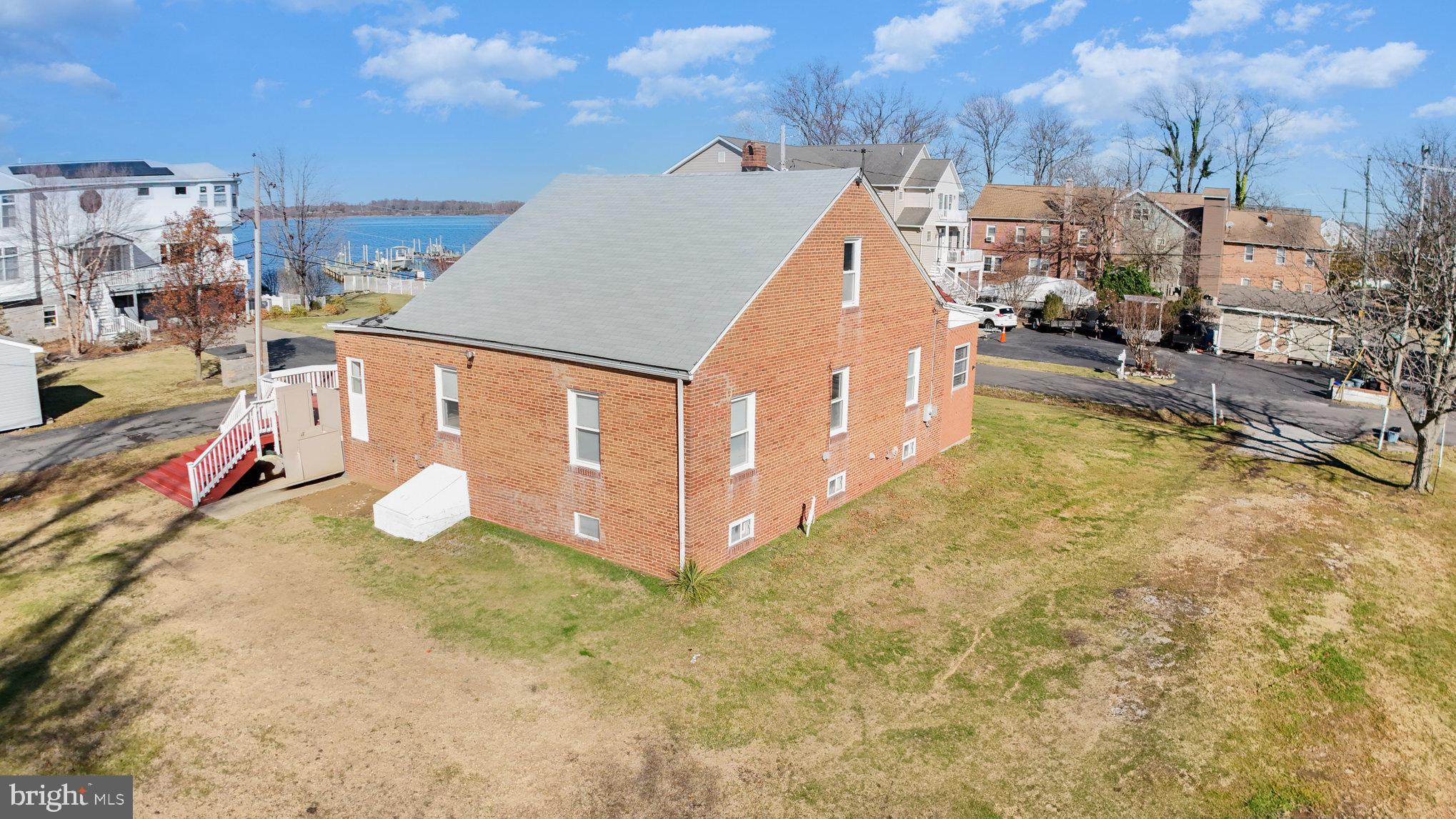 2810 & 2810-a 12th Street Baltimore, MD 21219 - Photo 43 of 67 a view of a house with a swimming pool